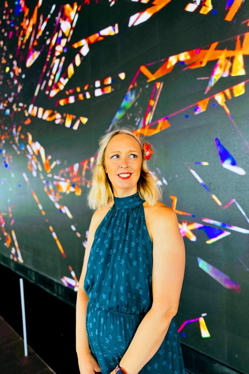 Today I'm looking back at a lovely day out in London when we stumbled upon The Spaces In-between, an amazing interactive light exhibition by Pixel Artworks and visual light artist Rupert Newman. As well as sharing a little peek at this colourful London discovery, I thought it was the perfect opportunity to share what I wore for our day out. When we're exploring London, I always like to wear something comfortable but still feel dressed up. After all, there's usually lots of walking involved! For this outing, I wore a dress from Apricot Clothing, teamed with my handbag from TK Maxx and my trusty Converse shoes. A dress and trainers are such an easy combination for a day of sightseeing, especially when you want to look stylish without sacrificing comfort. The exhibition provided such a fun and colourful backdrop for our photos, making this a lovely little outfit post to look back on. So, let's take a look at what I wore and a few of my favourite moments from our London adventure! What I Wore In London: My Apricot Dress And Converse
